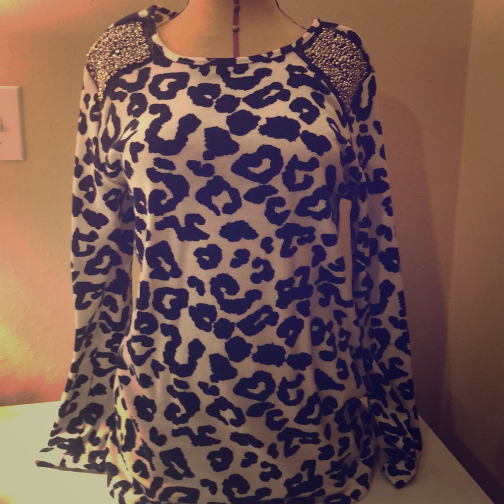 Women’s sweater with embellishments on shoulders